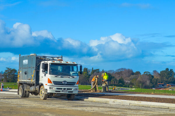 Workers using Hydro Master 2000 outside