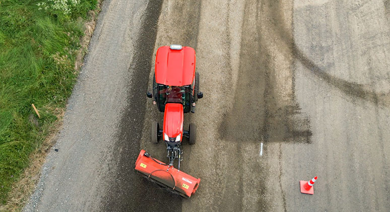 SweepMaster top view sweeping the road